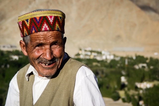 Man sporting traditional hat in northern India.