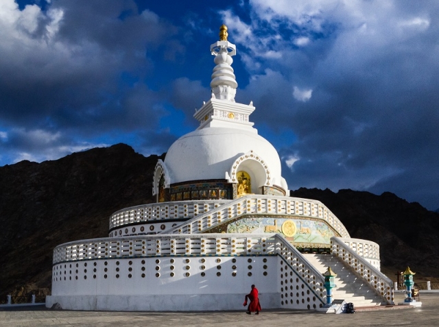 A devoted monk makes his morning rounds at Shanti Stupa in Leh, Ladakh, northern India.